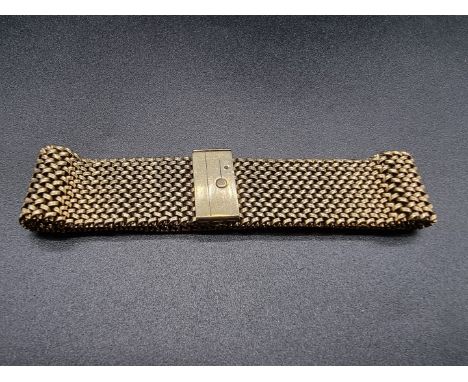 A vintage 9ct gold mesh bracelet, by N K, London 1970, 19mm wide, approximately 20cm long, 43.9g. 