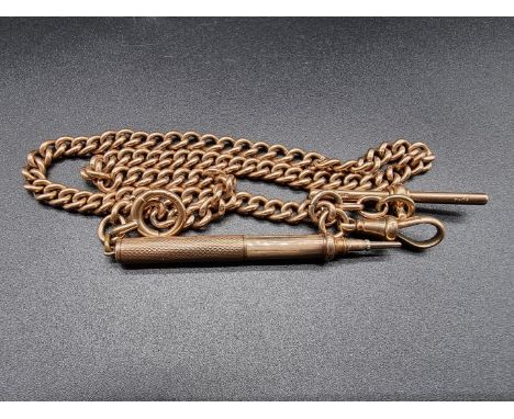 A yellow metal flat curb link Albert watch chain,&nbsp;stamped 9ct, 43cm with an attached engine turned 9ct gold pencil, by&n