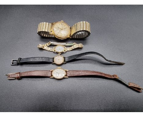 Three 9ct gold manual wind ladies wristwatches; together with a vintage J W Benson gold capped automatic wristwatch, 34mm. (4