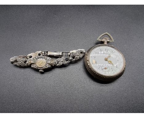 An Eridano white metal stem wind pocket watch, 40mm; together with a vintage ladies cocktail wristwatch. (2) 