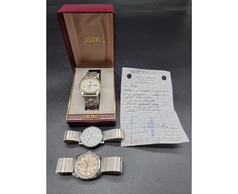 A cased Seiko SQ stainless steel and gold plated quartz wristwatch, 38mm; together with a Timex and a Sekonda wristwatch. (3)