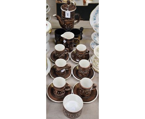 A Cinque Ports Pottery coffee set, for six, comprising cups, saucers, coffee pot, milk jug and sugar bowl; a Portmeirion comm