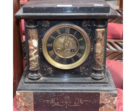 A 'belge noir' mantel clock, 10.5cm dial with 'gilt' Roman numerals flanked by specimen stone pilasters, stepped base, 28.5cm