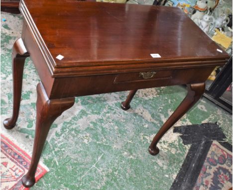 A 19th century mahogany double-action card and tea table, rectangular double-hinge top enclosing a plain surface and a baize 