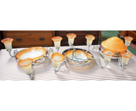 A 20th century chromium effect ceiling light, fluted glass shades terminating in a graduated amber hue; other similar (3)