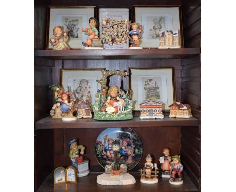 A Goebel Hummel figure, Retirement Exclusive 2001, Easter Morning; others, Today's Children; Apple Tree Boy; Clock Tower, Ang