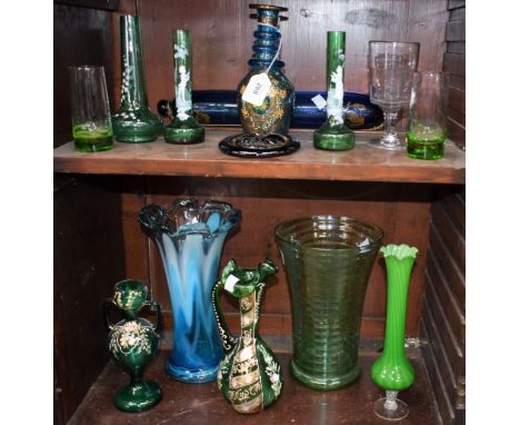 A Victorian green glass two handled vase, painted and gilded with flowers, pontilled base; others similar; a Bristol blue gla