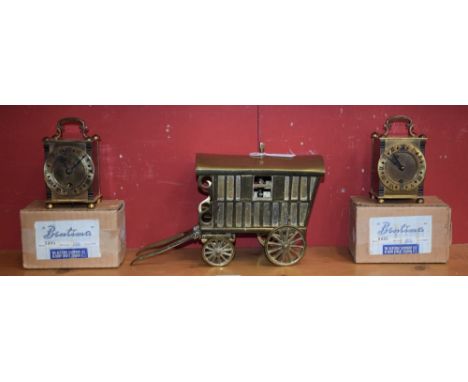 A Bentima carriage type clock, brass finish, four jewel pin pallet escapement; another similar, boxed; a heavy brass gypsy ca