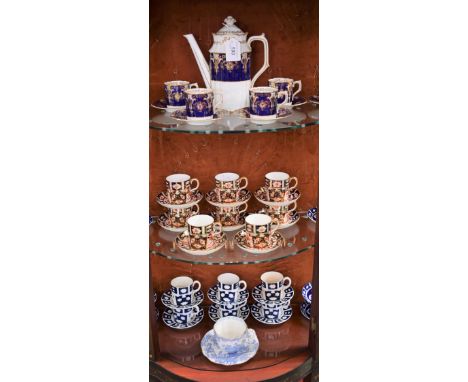 Ceramics - a set of eight Royal Crown Derby Imari coffee cans and saucers; another set of six blue and gilt with coffee pot, 