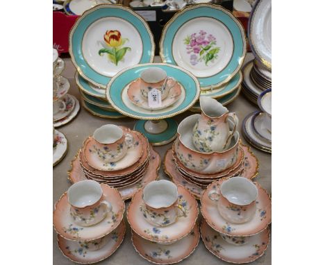 A Limoges part tea set, by M Redon, retailer's mark for John Donald &amp; Co, Edinburgh, c.1910, comprising cups, saucers, mi