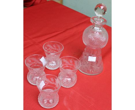A Scottish crystal glass Whisky decanter and set of four glasses, cut and etched thistle design Condition: 7.5cm high, with a