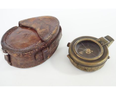 A 1917 British Army Venrer's patent prismatic marching compass in 1911 dated leather case