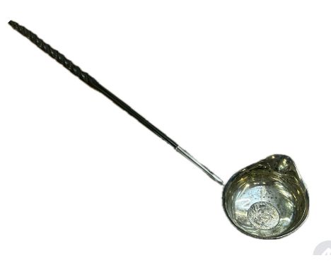 Unmarked silver toddy ladle with whale jaw handle, 1758 George II shilling 