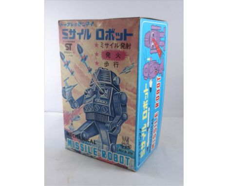 1970S CLOCKWORK 'MECHANICAL MISSILE ROBOT' IN ORIGINAL BOX WITH PACKAGING, APPEARS UNUSED