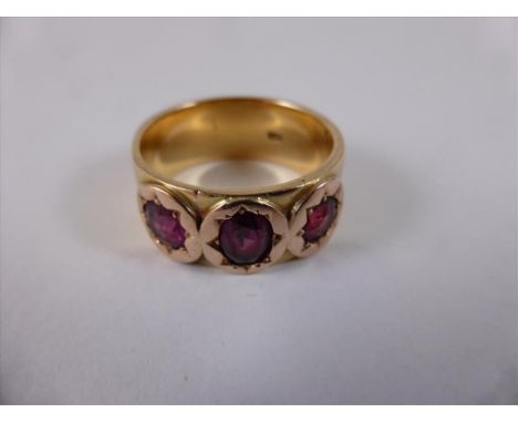 GENTS 18CT GOLD RING SET WITH 3 AMETHYST STONES, APPROX. 12g