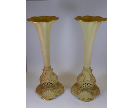 A PAIR OF WORCESTER BLUSH IVORY FLARED VASES, PIERCED AND WITH SHELL DECORATION TO THE BASE, NUMBERED 1938, APPROX 22.5 cm