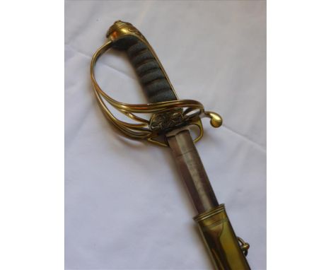 VICTORIAN ROYAL NAVY 1827 PATTERN SWORD WITH FULLERED BLADE AND RUBBED INSCRIPTION, LEATHER SCABBARD WITH FANCY BRASS MOUNTS,