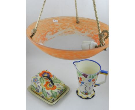 A 1930's Staffordshire jug, WH Grindley, with gay foliate decoration together with a similar cheese dome and an orange marble