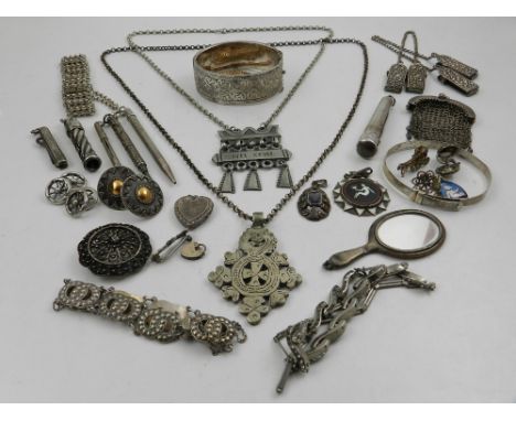 A quantity of silver and white metal items, to include a Victorian bangle, various pencils, bracelets, chains, pendants, etc.