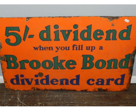 A vintage enamel sign for Brook Bond Tea, green text on an orange ground, H. 51cm.