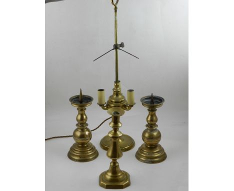 A mid 20th century brass three light table lamp, together with a pair of brass pricket stands with turned base, and a brass c