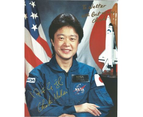 Chiaki Mukai signed 10x8 colour NASA portrait photo. Japanese physician and JAXA astronaut. She was the first Japanese woman 