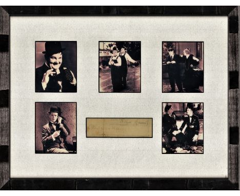 Laurel &amp; Hardy autographs professionally framed and mounted with small photos to an overall size of 15 x 12 inches. The a