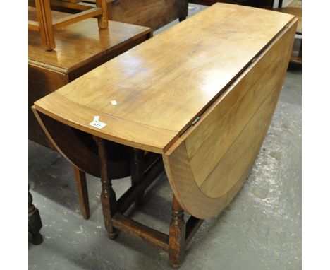 Early 20th century mixed woods gate leg table.(B.P. 21% + VAT) 