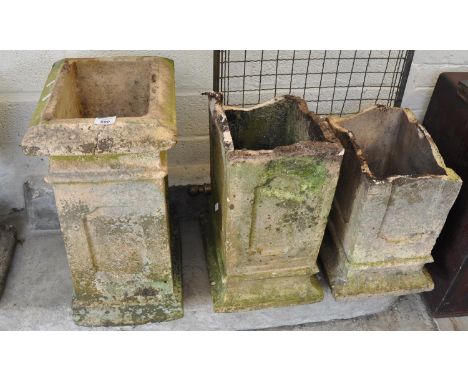 Three chimney stacks, two in very distressed and damaged condition, together with a brass and mesh firescreen. (4)(B.P. 21% +