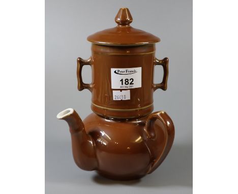 Royal Worcester bullet-shaped brown ground teapot, together with matching two-handled mug.(B.P. 21% + VAT) 