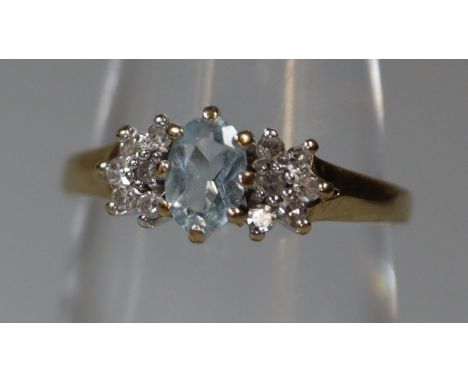 9ct gold and diamond and aquamarine ring. Ring size M&1/2. Approx weight 2 grams. (B.P. 21% + VAT) Condition is good, total d