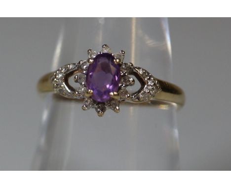 9ct gold amethyst and diamond ring. Ring size M. Approx weight 2 grams. (B.P. 21% + VAT) Condition is good, Total diamond wei