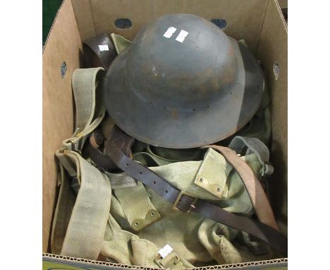 A box containing assorted World War II British army webbing, belt and assorted strapping, officers brown belt and a Police st