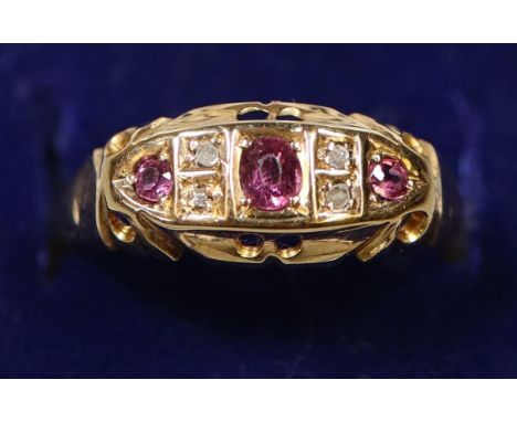 18ct gold ruby and diamond ring.  Ring size M.  Weight approx 2.8 grams.(B.P. 21% + VAT) 