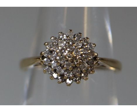 9ct gold and diamond cluster ring.  Ring size J&1/2.  Approx weight 2.1 grams.(B.P. 21% + VAT) 