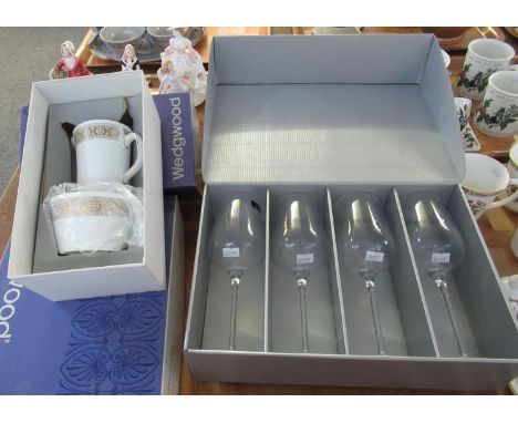 A set of four Royal Doulton wine or hock glasses in original box, together with a Wedgwood 'Marguerite' sugar bowl and cream 