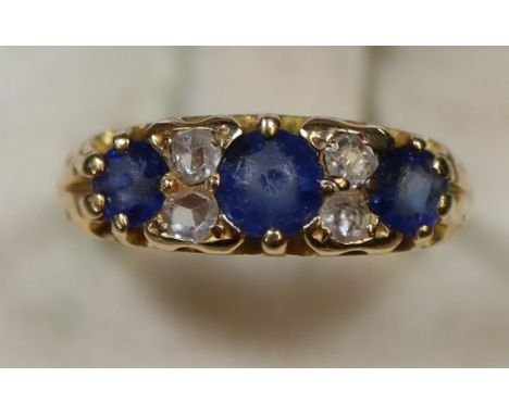 18ct gold sapphire and diamond ring. Ring size L&1/2. Approx weight 3.2 grams. (B.P. 21% + VAT) Diameter approx. 4mm Depth ap