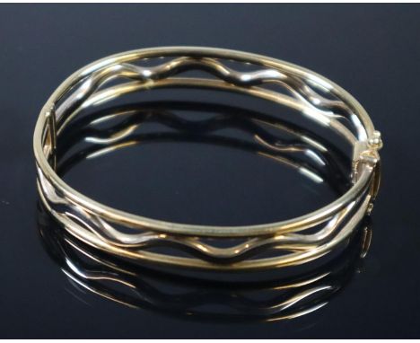 9ct gold openwork bangle.  Approx weight 15.4 grams.(B.P. 21% + VAT) 