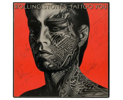 A USA vinyl pressing of the 1981 Rolling Stones album ‘Tattoo You’ that has been autographed by the group in black ballpoint 