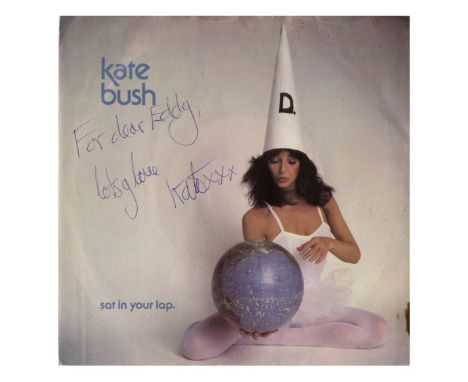 A UK pressing of the 1981 Kate Bush single ‘Sat In Your Lap’ which has been signed by Kate, first name only, on the front of 