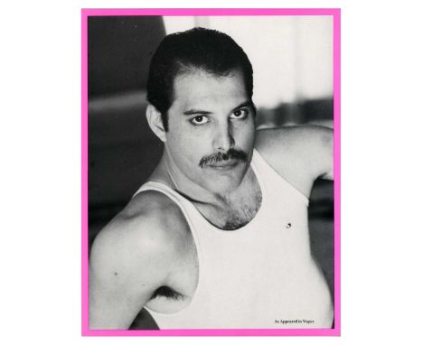 ˑ A 1980s day glow pink Christmas card that features a black and white image of Freddie Mercury on the front taken during a p