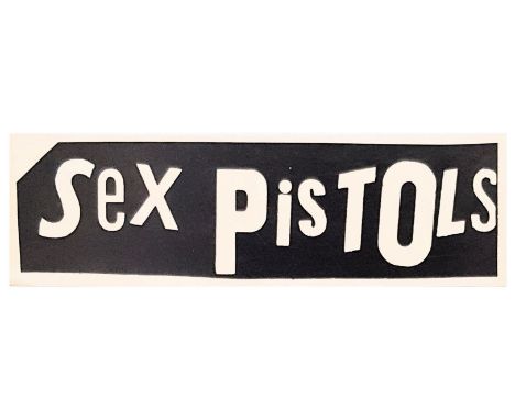 An original promotional banner circa 1977 for the Sex Pistols. It features the band's name in a black and white design.
The b
