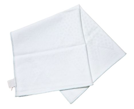 ˑ A square white spotted cotton napkin that was previously owned by Freddie Mercury. It was manufactured by Artraco and sold 