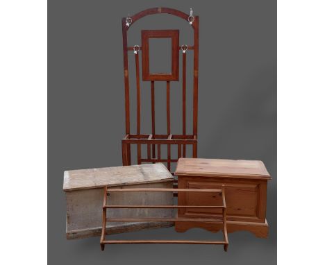 A painted pine trunk together with a similar pine trunk, an Ercol plate rack and a hall stand 