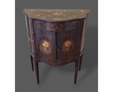 A Sheraton revival small commode of serpentine form, the hinged top enclosing divided interior and two doors raised upon squa