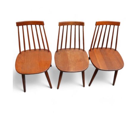 Set of three mid-20th century Swedish teak stick-back chairs, raised on tapering supportsDimensions: Height:&nbsp;82cm&nbsp; 