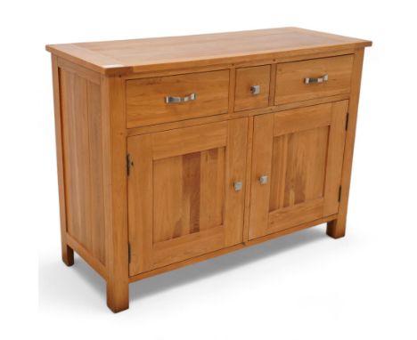 Light oak sideboard, fitted with three drawers and two cupboardsDimensions: Height:&nbsp;89cm&nbsp; Length/Width:&nbsp;121cm&