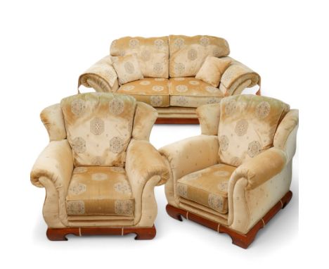 Three-seat sofa (W197cm, D103cm) and pair of matching armchairs (W100cm); upholstered in pale gold fabric decorated with Gul 