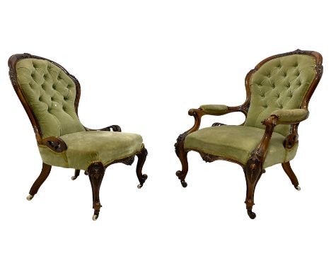 Pair of lady's and gentleman's Victorian carved walnut armchair and nursing chair, foliate carved cresting rail over shaped b