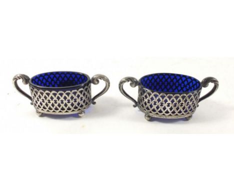 A pair of oval silver salts with blue glass liners, Birmingham 1903, 8.5cm wide 
